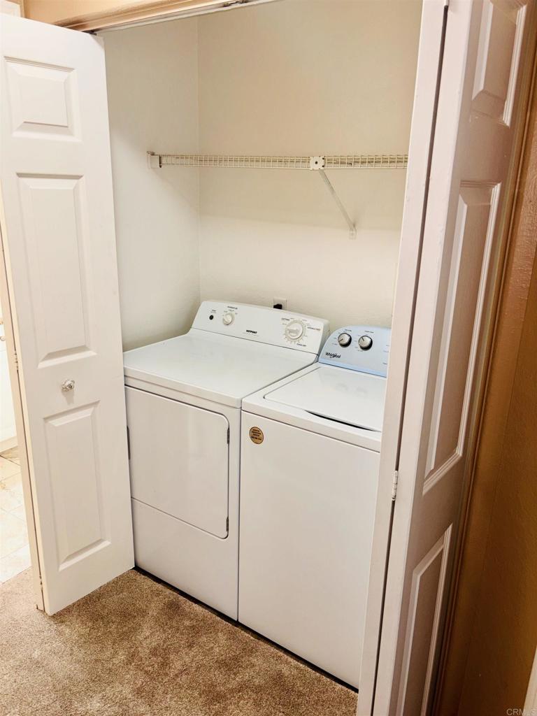 3545 Paseo De Francisco, Unit 225 Oceanside, CA 92056 - Photo 27 of 34 a utility room with dryer and washer