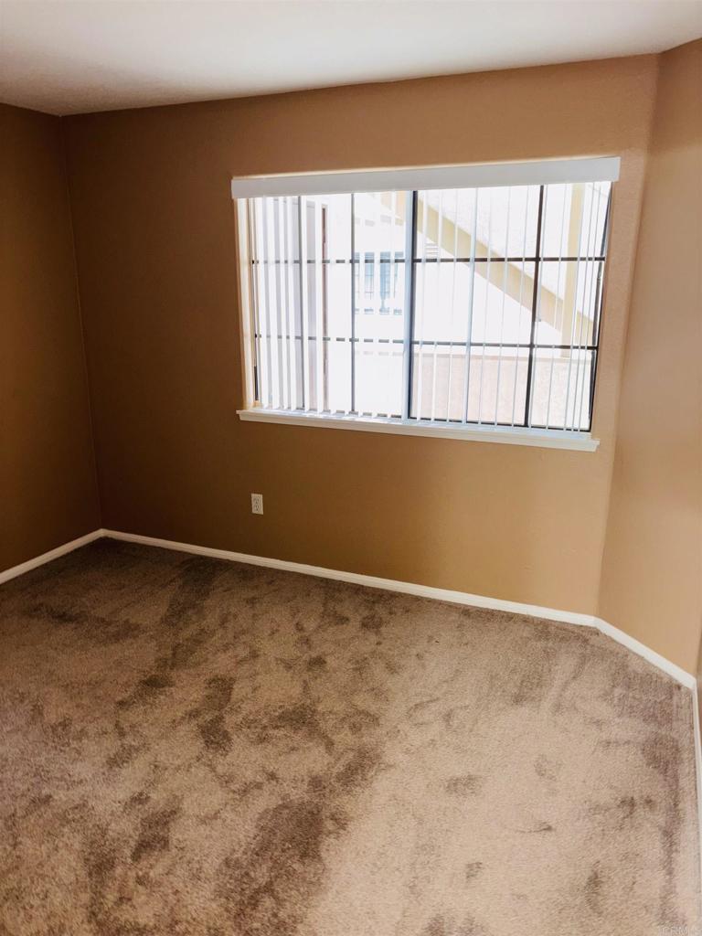 3545 Paseo De Francisco, Unit 225 Oceanside, CA 92056 - Photo 29 of 34 a view of an empty room with a window