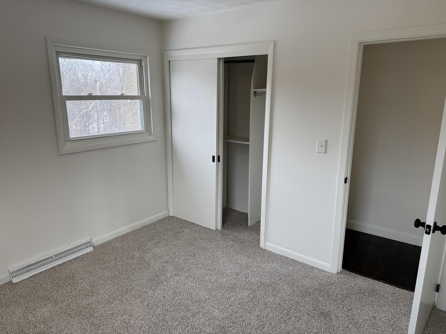 2452 Florian Court Decatur, IL 62526 - Photo 14 of 28 an empty room with windows and closet