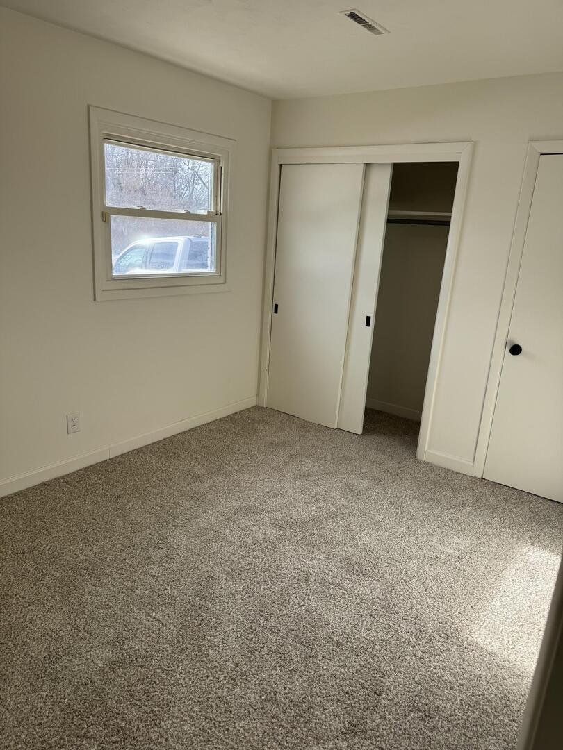 2452 Florian Court Decatur, IL 62526 - Photo 20 of 28 a view of an empty room with closet and closet