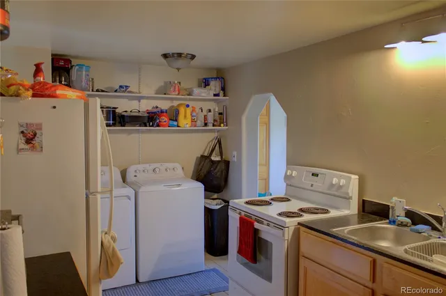 a view of a storage & utility room with closet