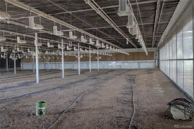 a view of a dry room with wooden floor