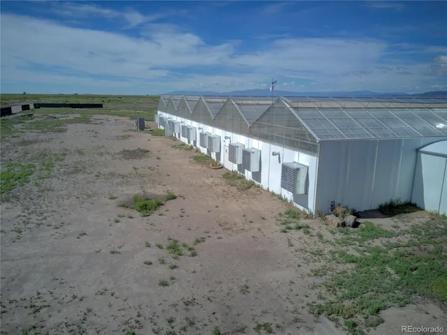 a house view with a backyard space