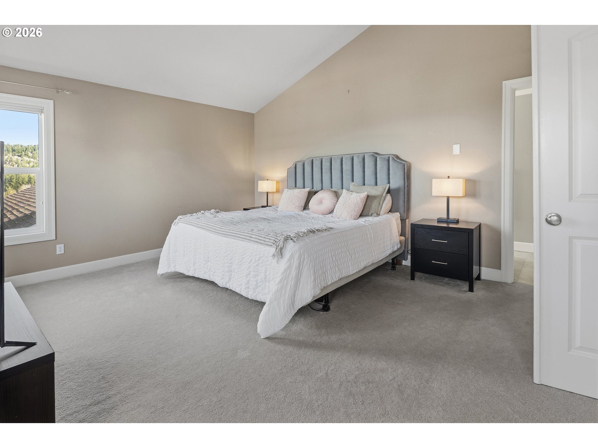 3525 Northwest Sunset View Terrace Portland, OR 97229 - Photo 20 of 48 a bedroom with a bed and a window