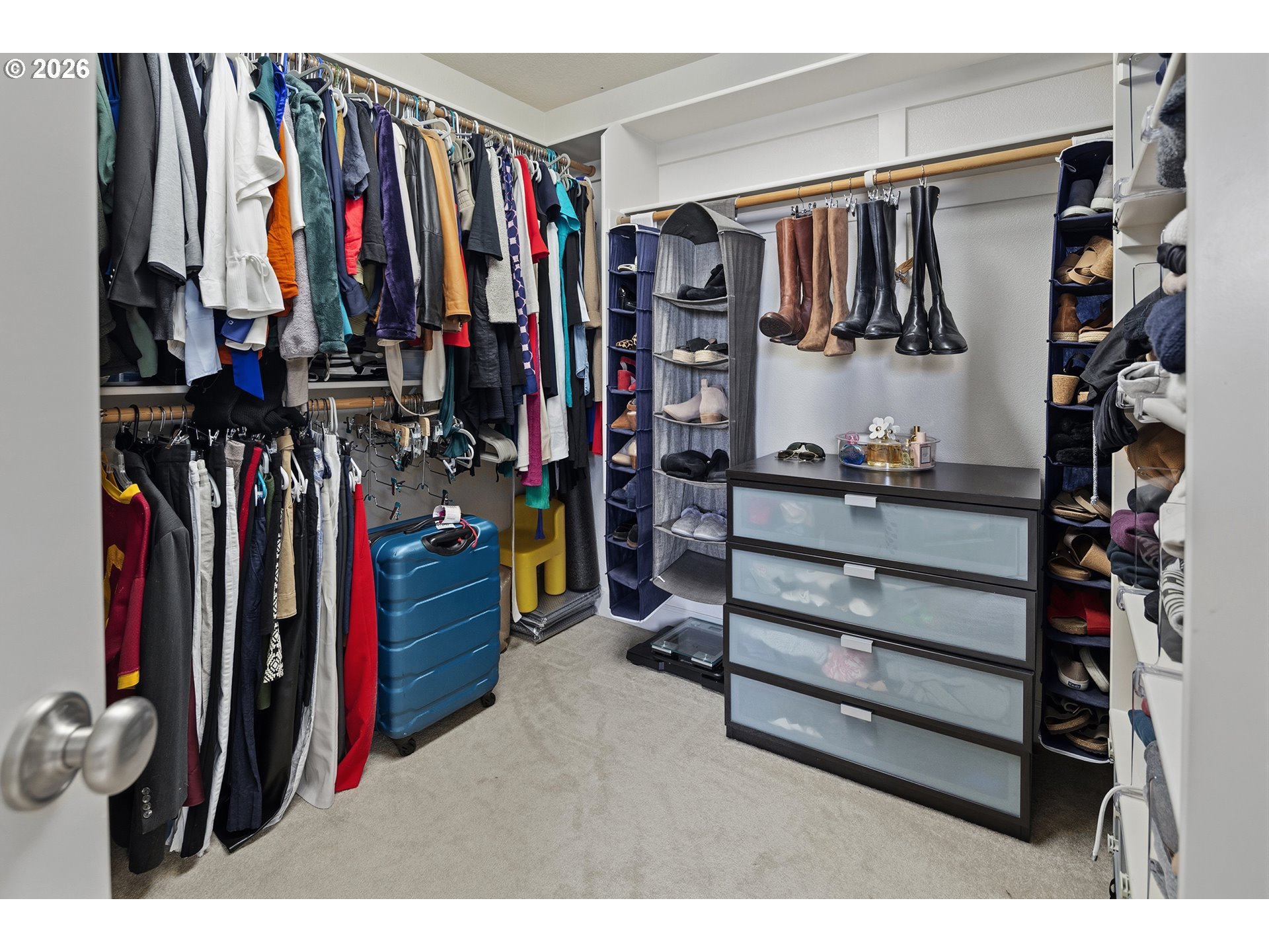3525 Northwest Sunset View Terrace Portland, OR 97229 - Photo 25 of 48 a view of walk in closet with clothes and shoes