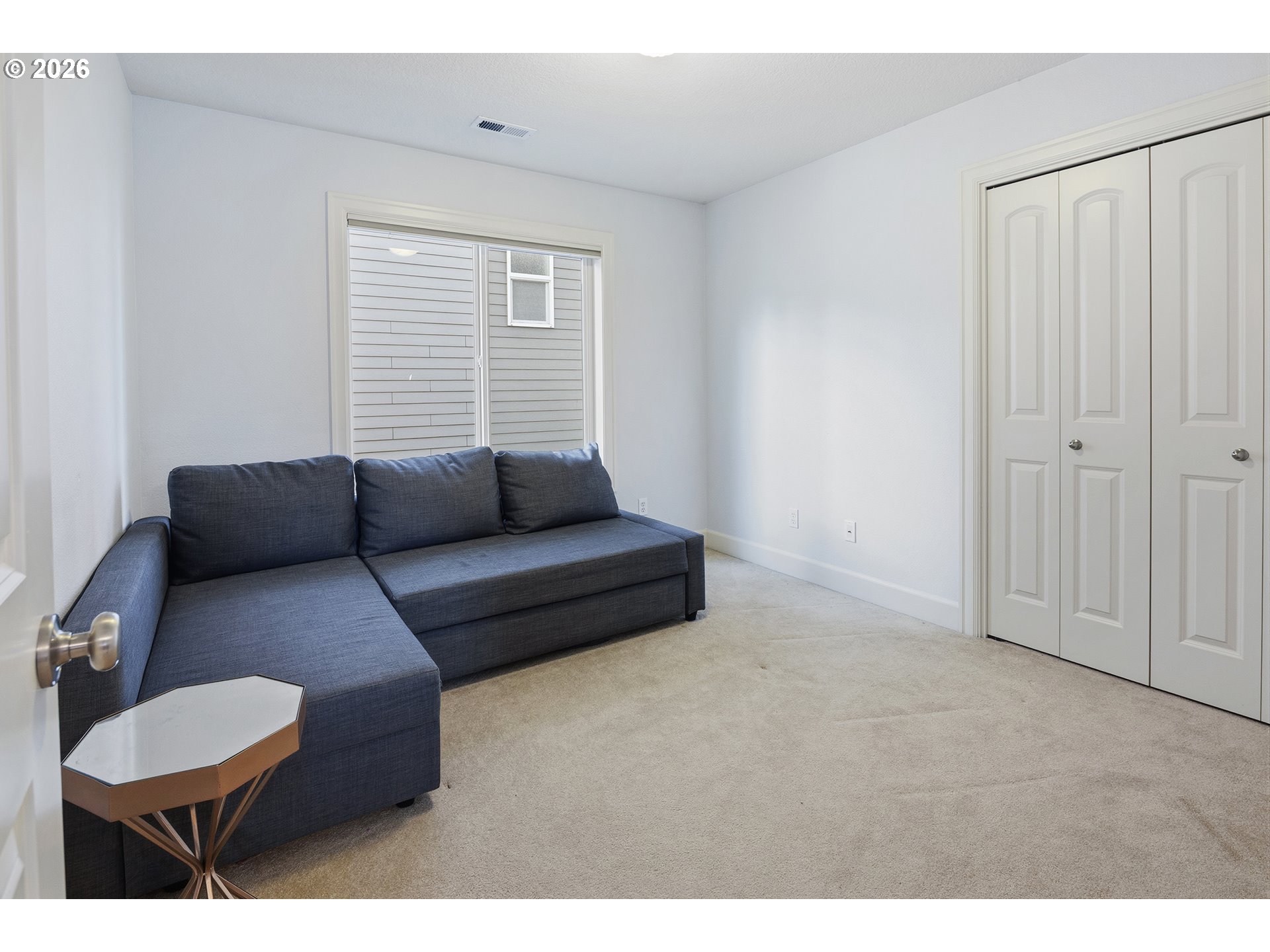 3525 Northwest Sunset View Terrace Portland, OR 97229 - Photo 32 of 48 a living room with furniture and a window