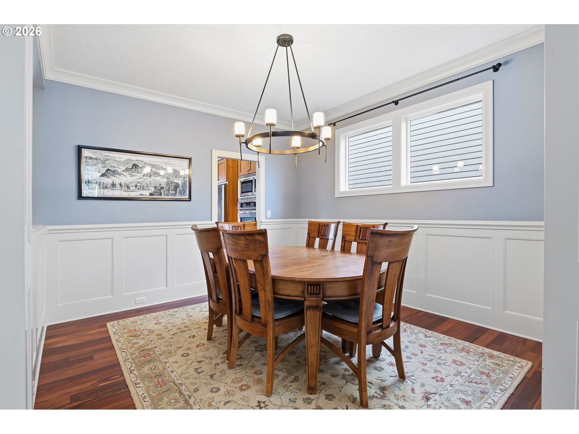 3525 Northwest Sunset View Terrace Portland, OR 97229 - Photo 4 of 48 a view of a dining room with furniture window and wooden floor