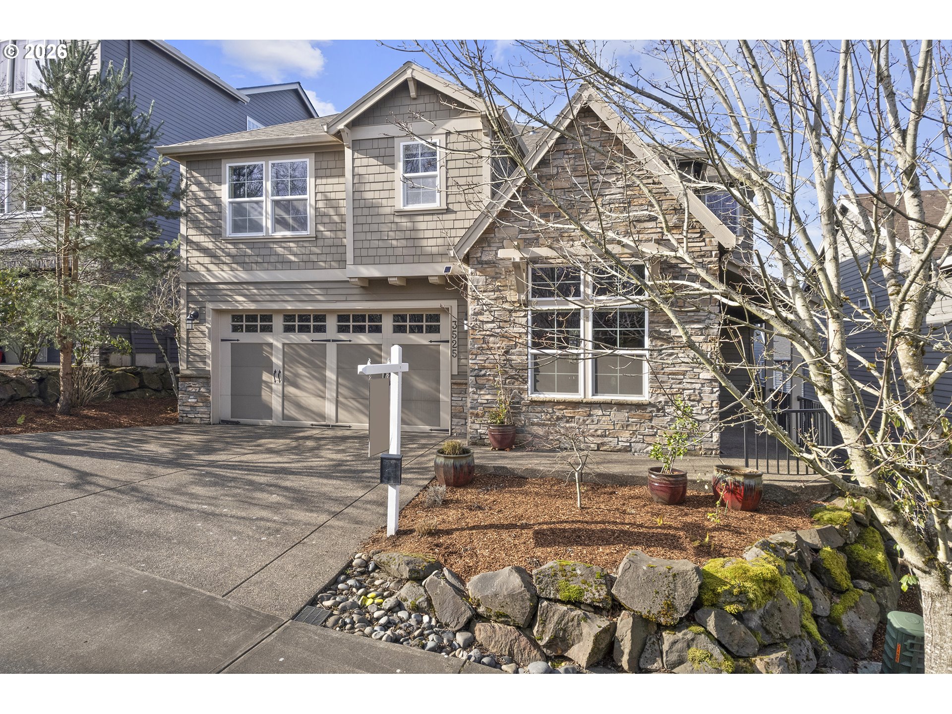 3525 Northwest Sunset View Terrace Portland, OR 97229 - Photo 47 of 48 a front view of a house with a yard