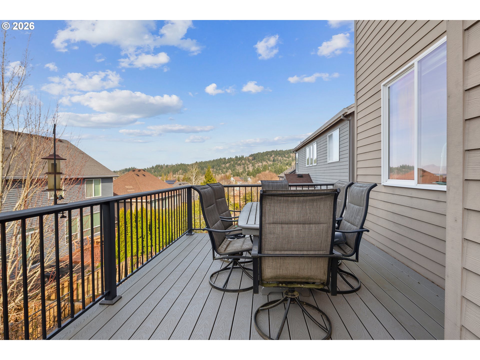 3525 Northwest Sunset View Terrace Portland, OR 97229 - Photo 10 of 48 a view of a balcony with furniture