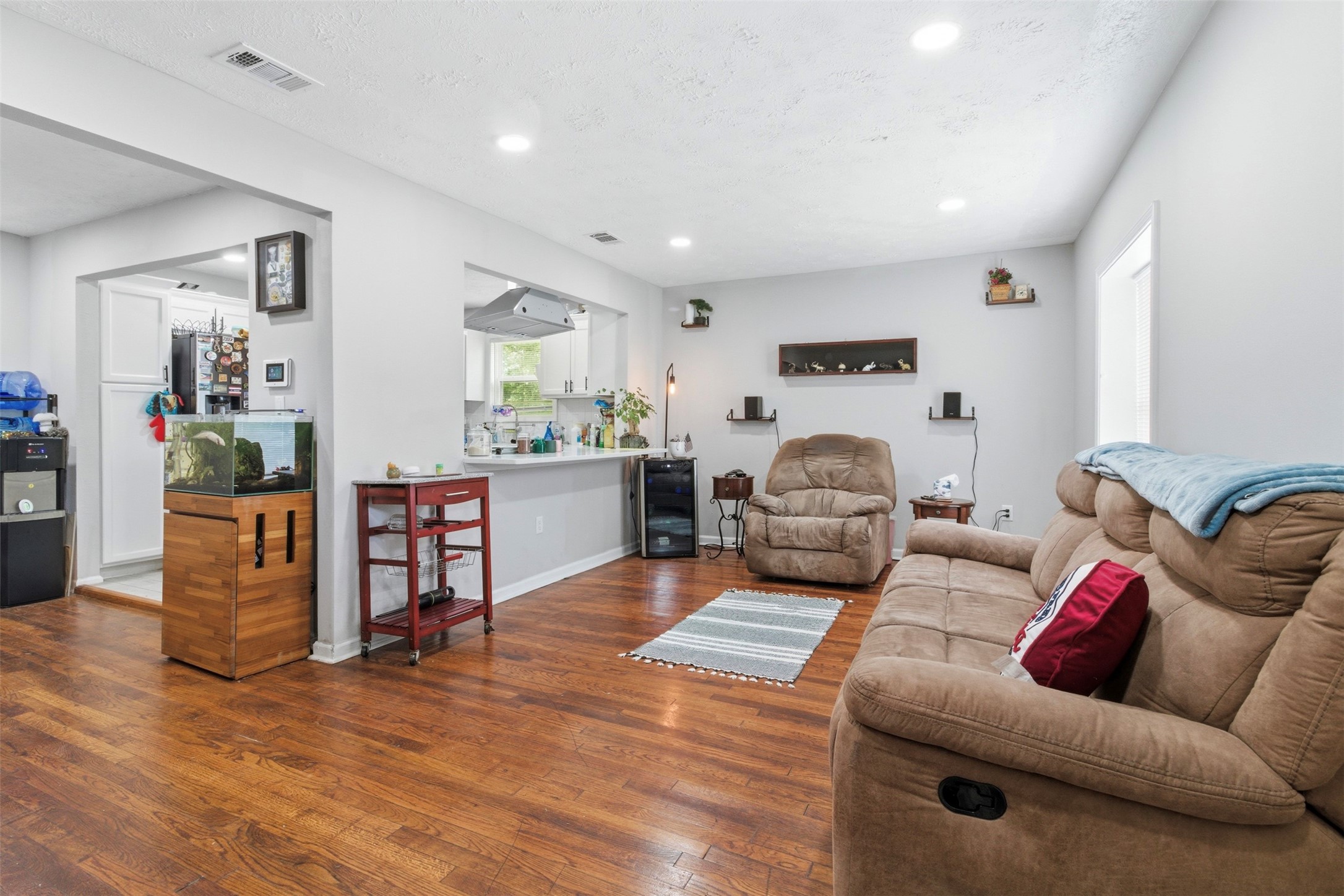306 Center Street Pasadena, TX 77506 - Photo 6 of 31 a living room with furniture and a wooden floor