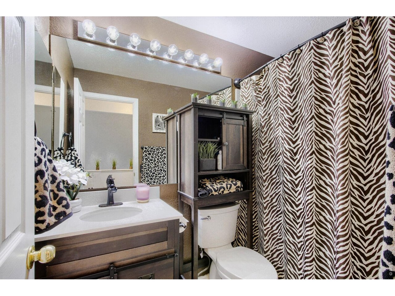 4775 Flower Street Wheat Ridge, CO 80033 - Photo 14 of 18 Main Upper Bathroom