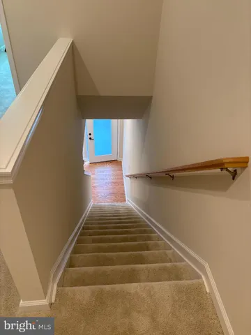 a view of storage and utility room with washer and dryer