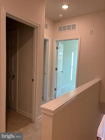 a view of a hallway with a elevator