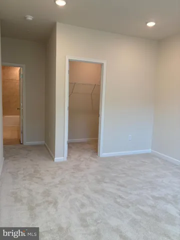 an empty room with an entryway