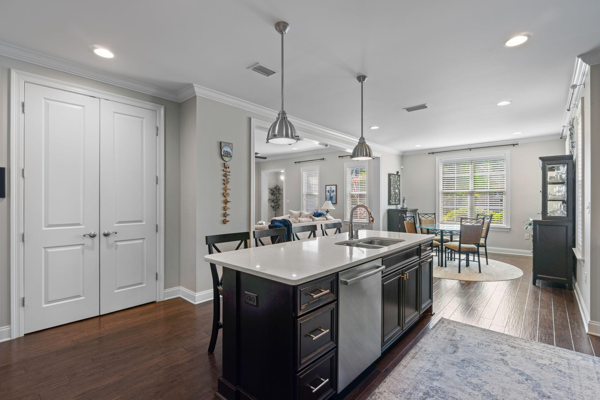 32 Derby Downs Circle Niceville, FL 32578 - Photo 17 of 62 a kitchen with a stove a refrigerator a dining table and chairs