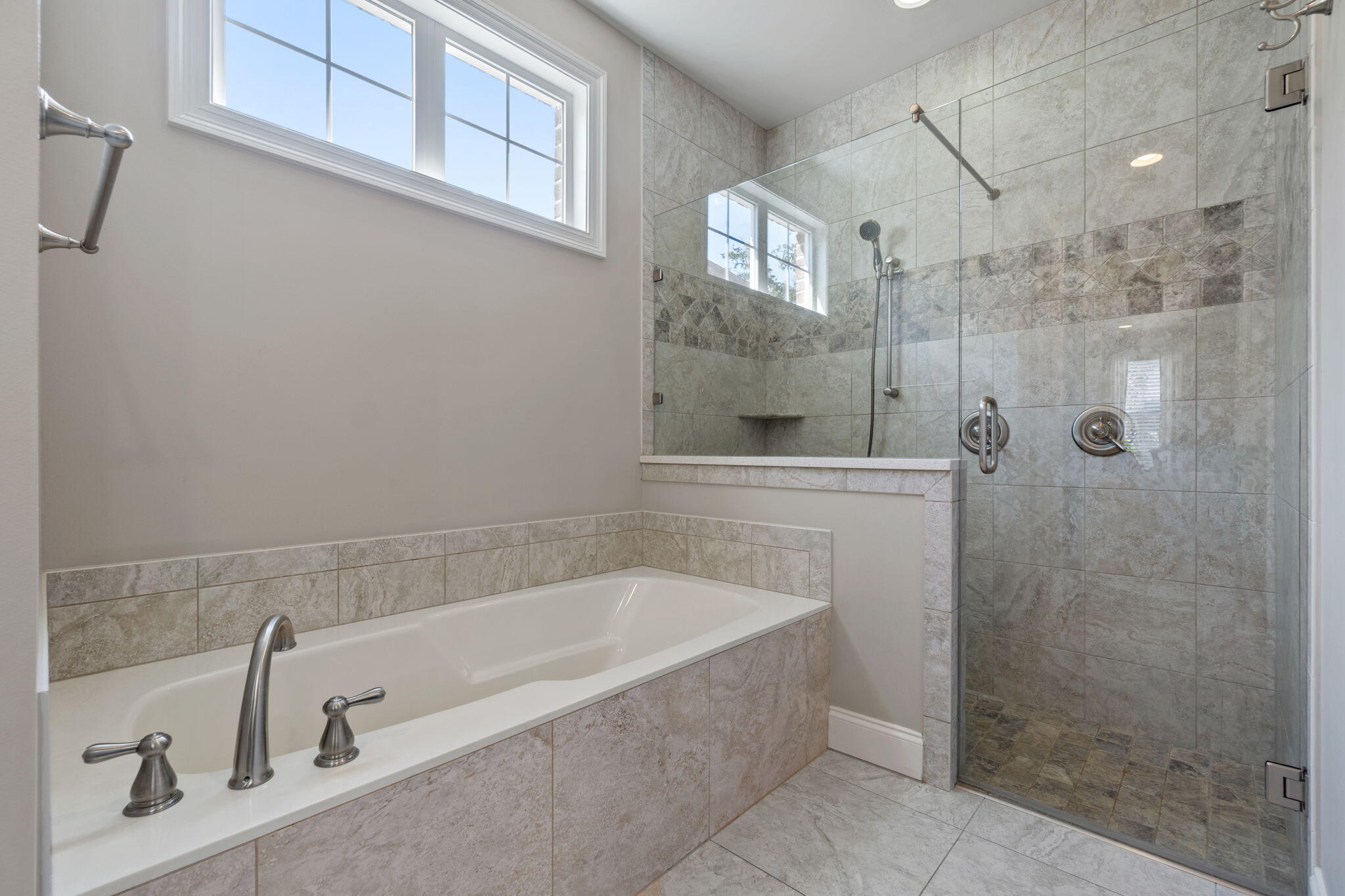 32 Derby Downs Circle Niceville, FL 32578 - Photo 25 of 62 a bathroom with a bathtub and shower