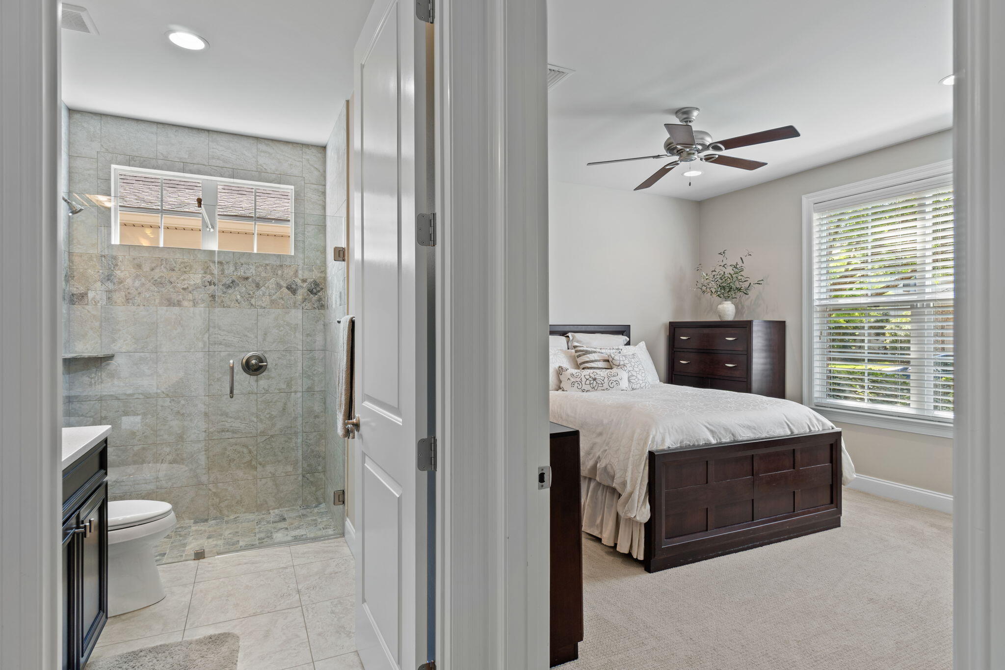 32 Derby Downs Circle Niceville, FL 32578 - Photo 29 of 62 a spacious bathroom with a granite countertop sink a toilet and shower