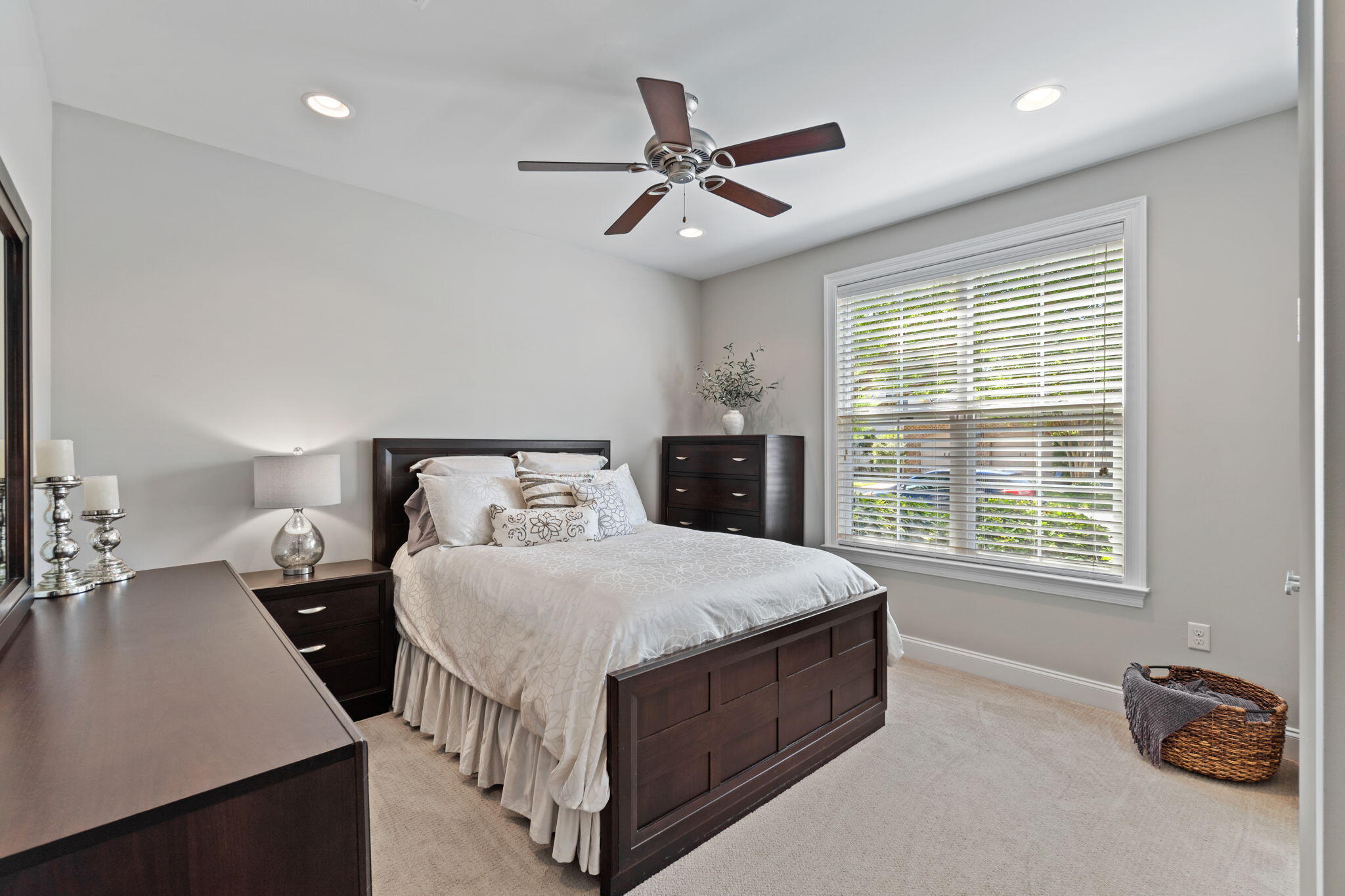 32 Derby Downs Circle Niceville, FL 32578 - Photo 31 of 62 a bedroom with a bed and a chandelier