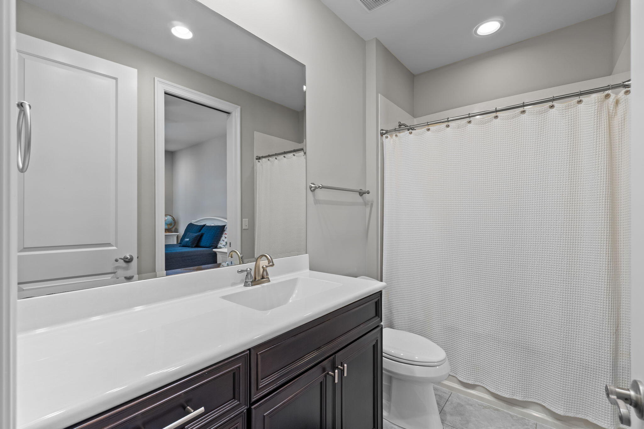 32 Derby Downs Circle Niceville, FL 32578 - Photo 38 of 62 a bathroom with a sink a toilet a mirror and shower