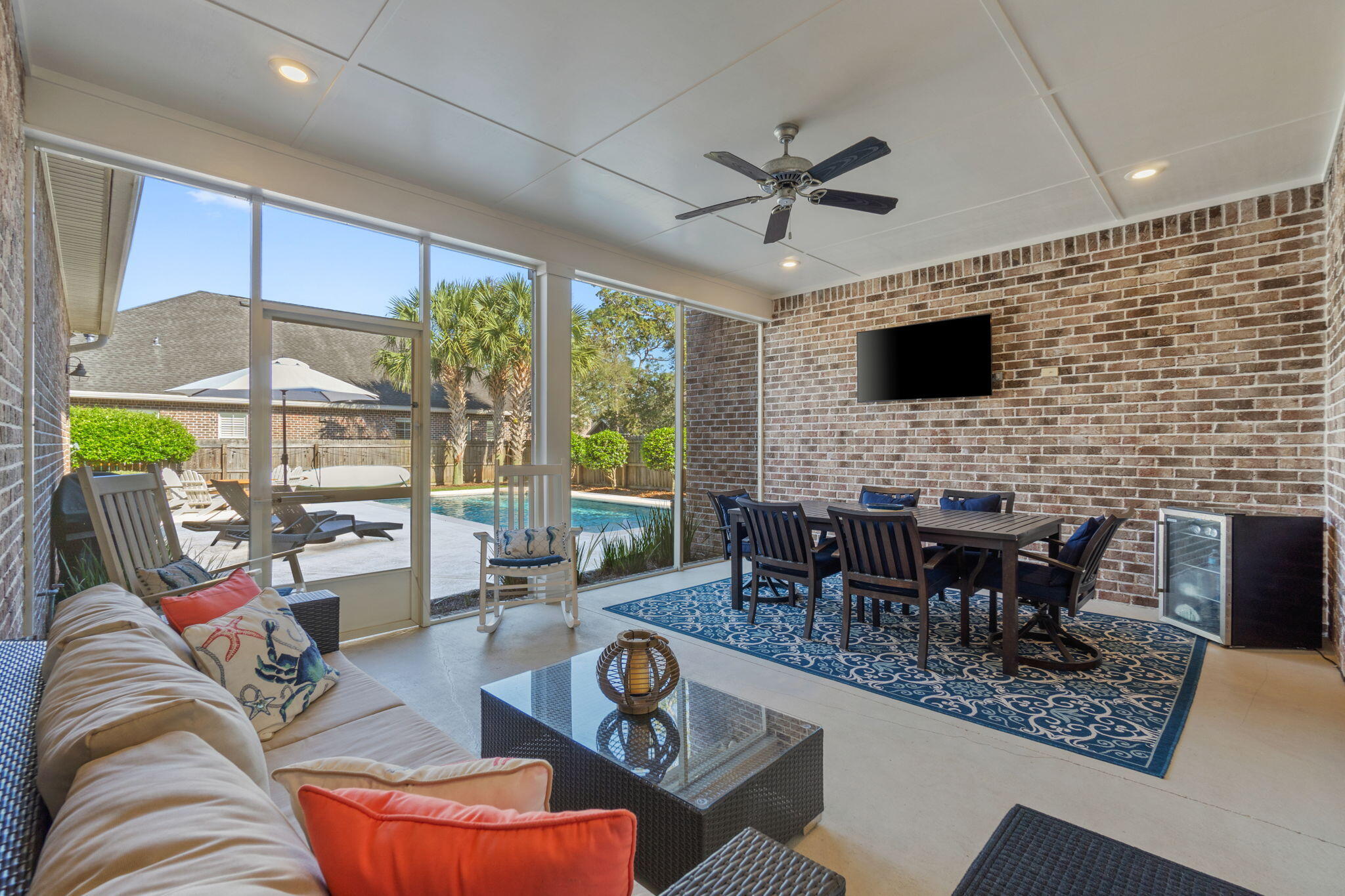 32 Derby Downs Circle Niceville, FL 32578 - Photo 44 of 62 a living room with furniture fireplace and a flat screen tv