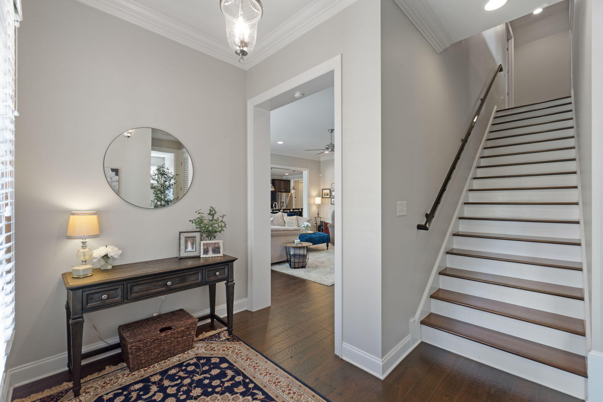 32 Derby Downs Circle Niceville, FL 32578 - Photo 6 of 62 a view of a hallway to a livingroom and a dining room with wooden floor