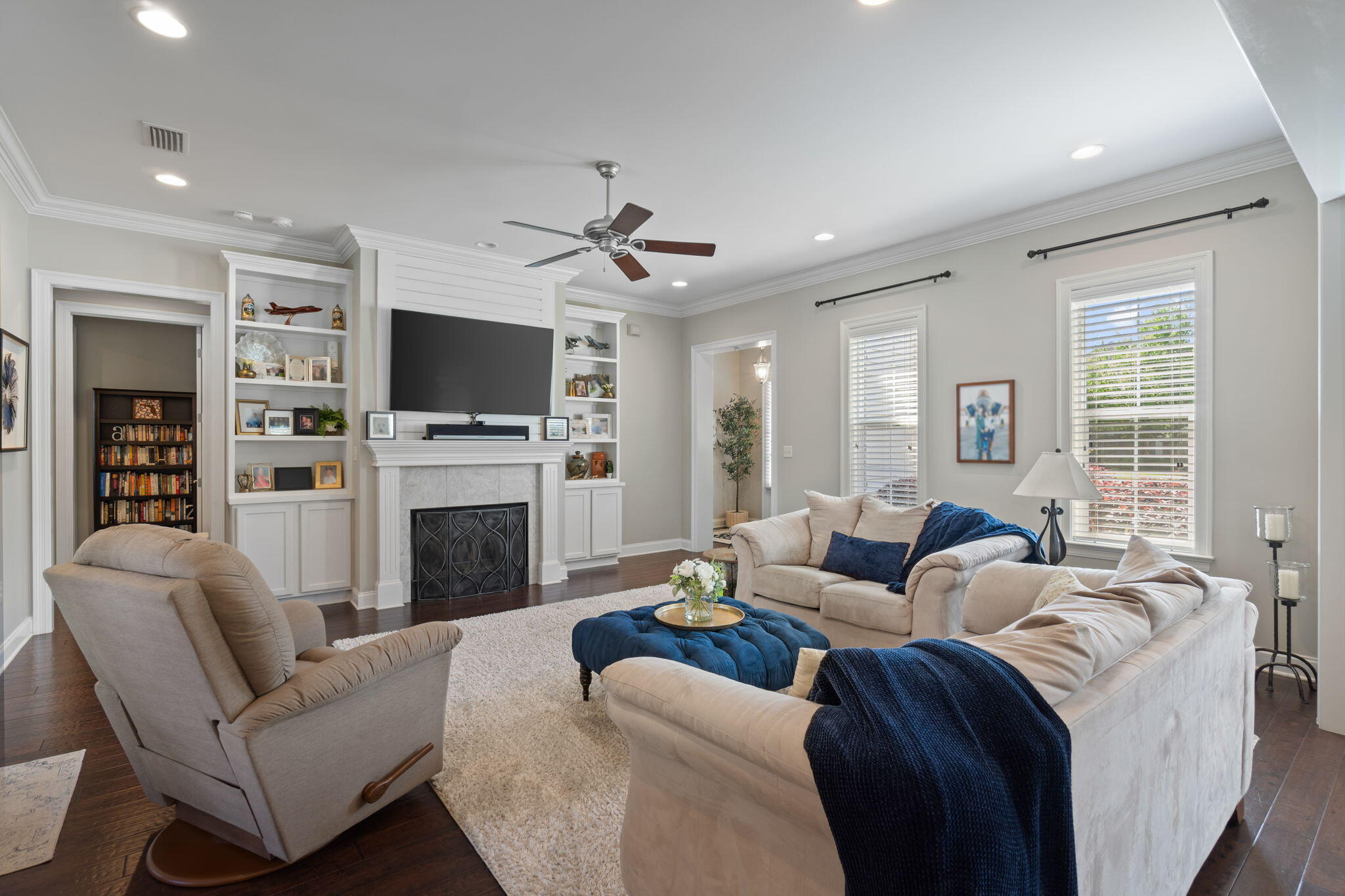 32 Derby Downs Circle Niceville, FL 32578 - Photo 8 of 62 a living room with furniture a fireplace and a flat screen tv
