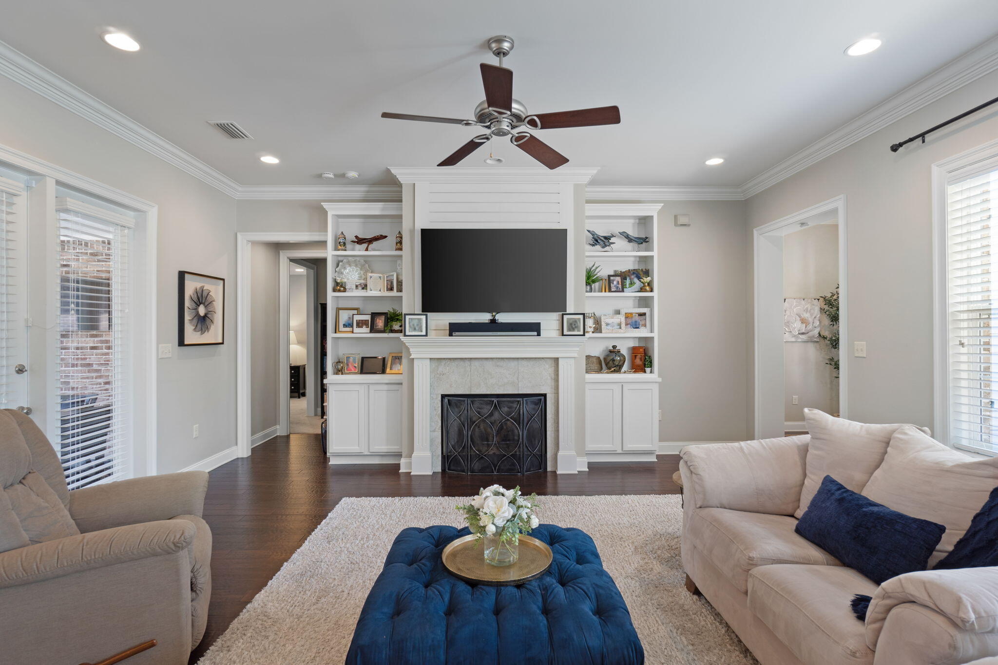 32 Derby Downs Circle Niceville, FL 32578 - Photo 9 of 62 a living room with furniture a fireplace and a flat screen tv