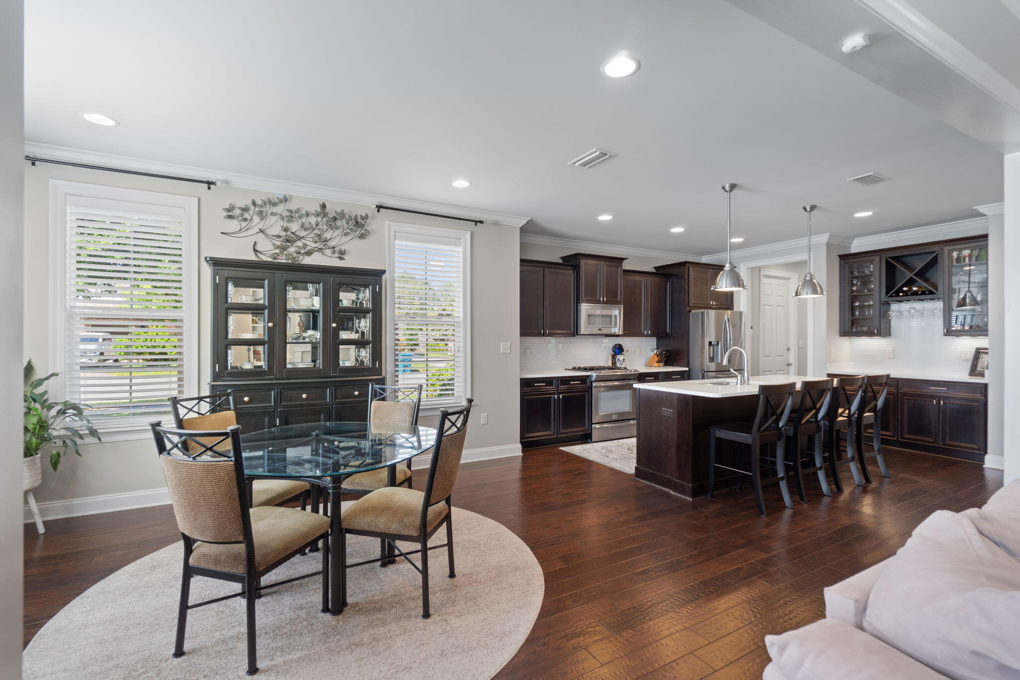 32 Derby Downs Circle Niceville, FL 32578 - Photo 10 of 62 a view of a dining room with furniture window and wooden floor