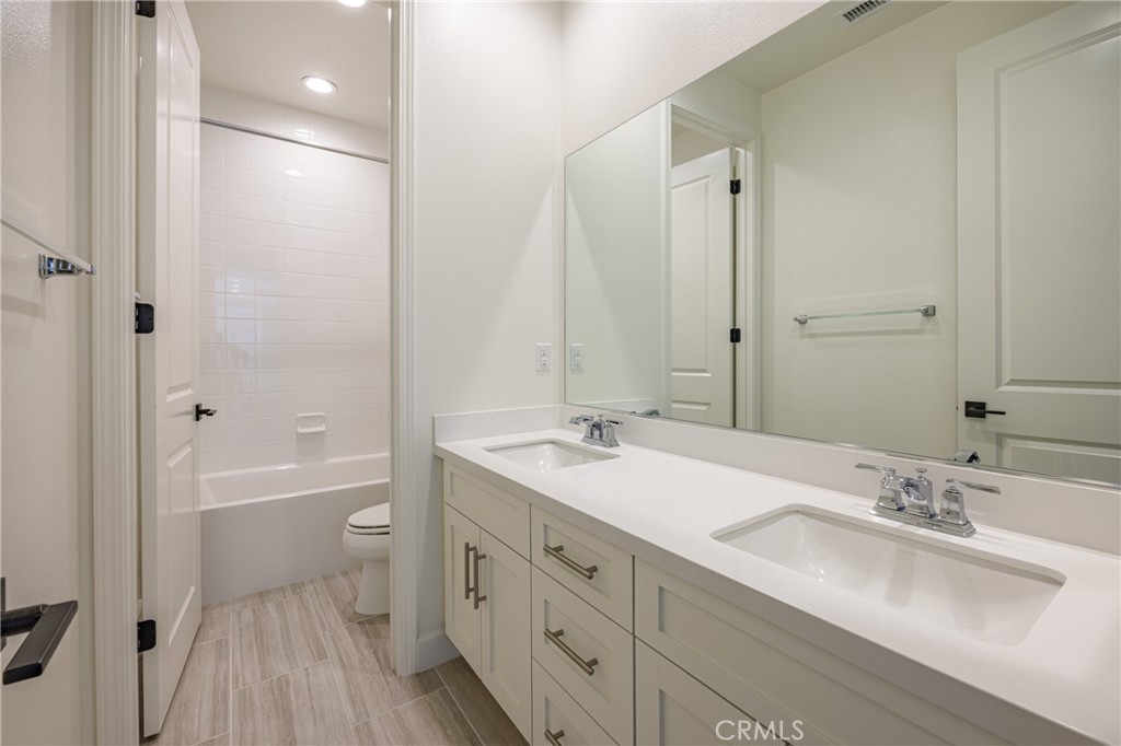 2017 Picasso Santa Ana, CA 92704 - Photo 13 of 31 a bathroom with a sink a toilet and shower