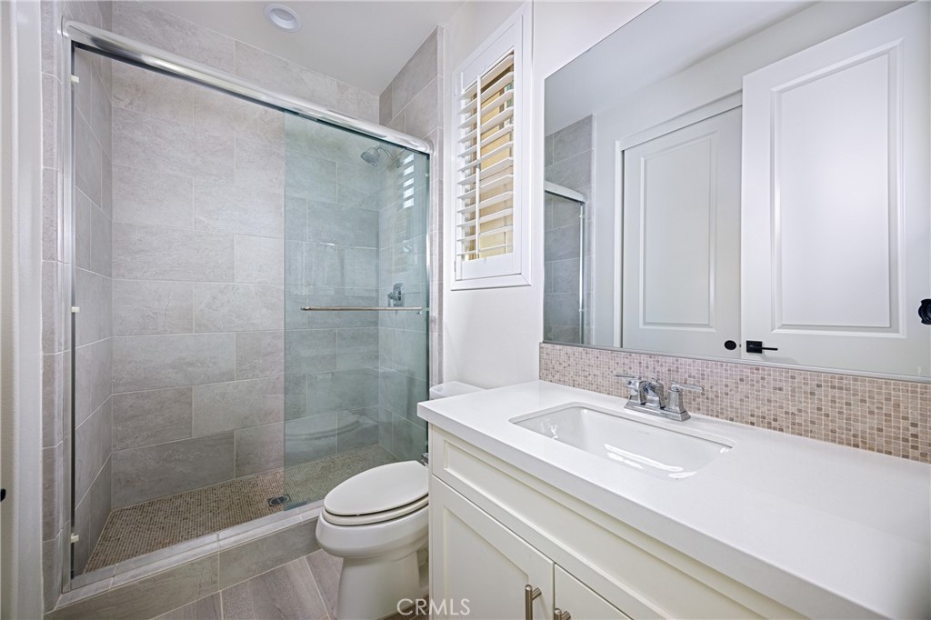 2017 Picasso Santa Ana, CA 92704 - Photo 16 of 31 a bathroom with a sink a toilet and shower