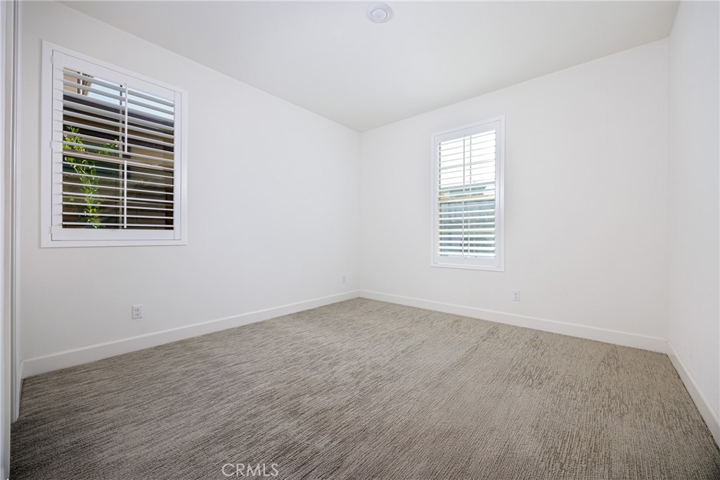 2017 Picasso Santa Ana, CA 92704 - Photo 17 of 31 an empty room with windows
