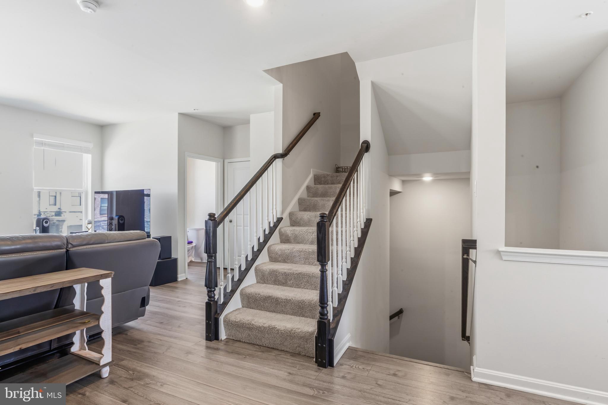 870 Amity Street Frederick, MD 21701 - Photo 24 of 56 a view of entryway and hall with wooden floor