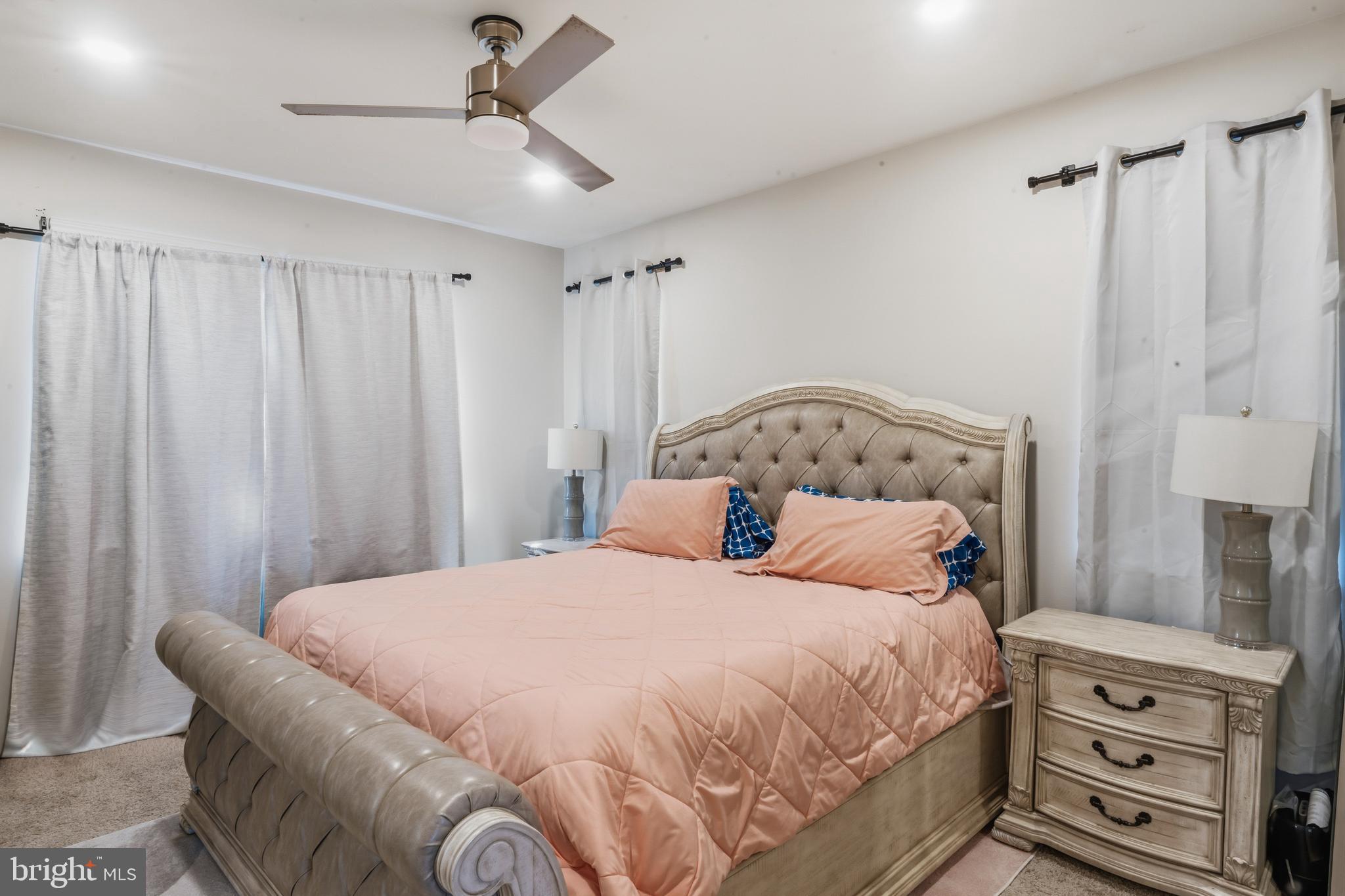 870 Amity Street Frederick, MD 21701 - Photo 32 of 56 a bedroom with a bed and a window