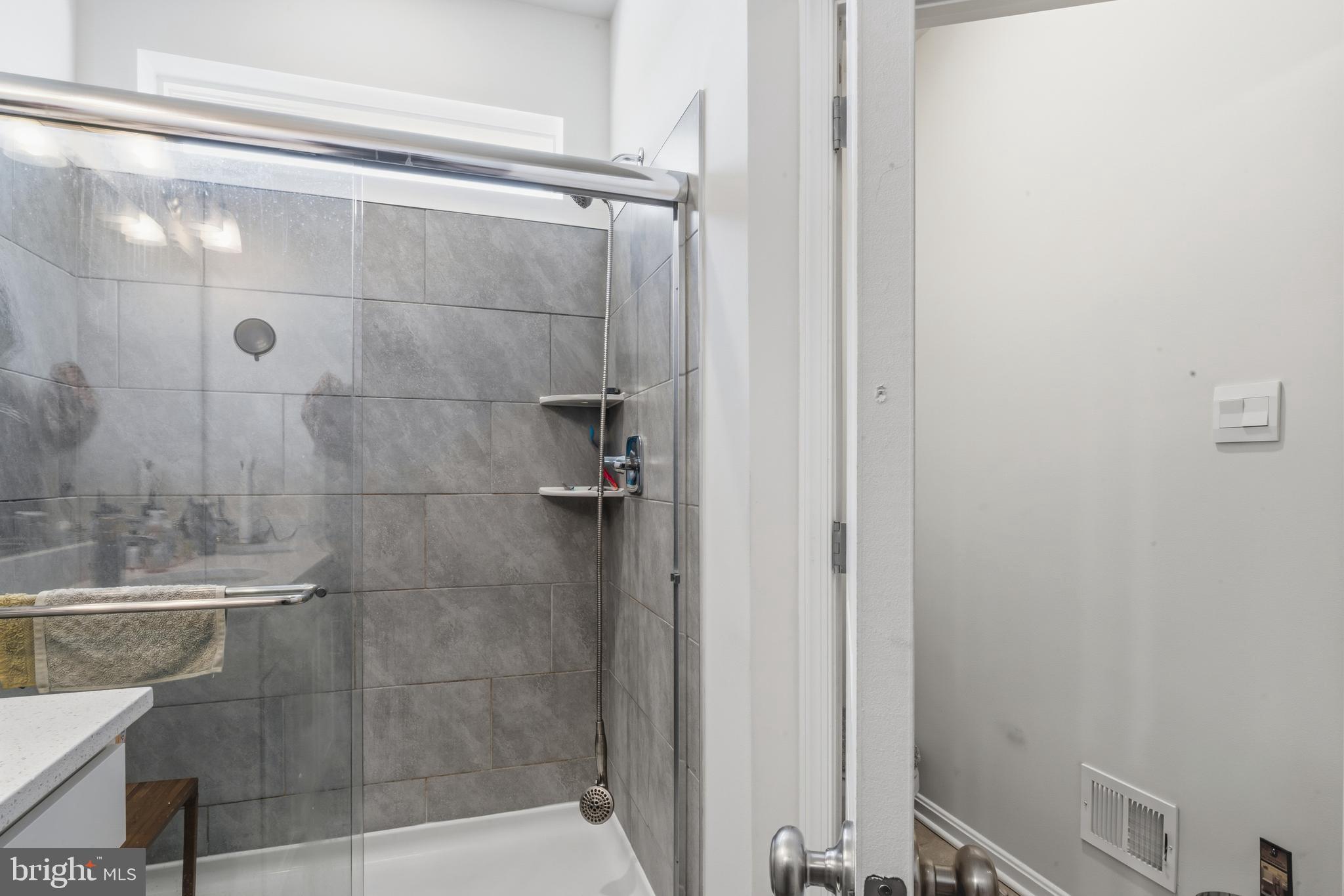 870 Amity Street Frederick, MD 21701 - Photo 36 of 56 a bathroom with a shower