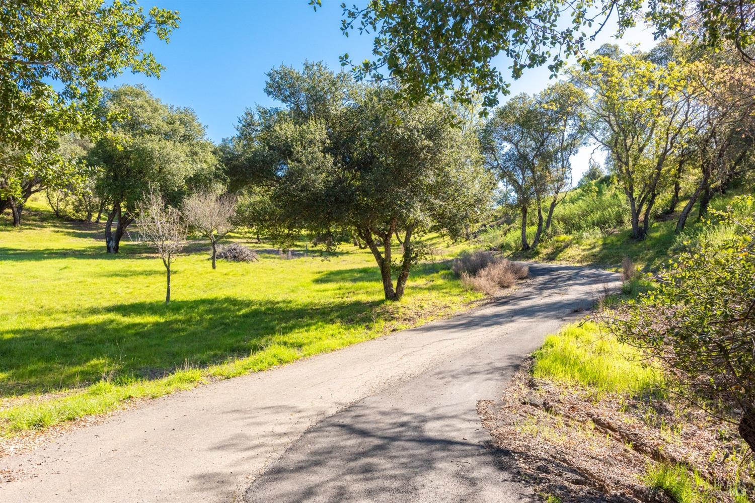 a view of a swimming pool with an outdoor space and seating area