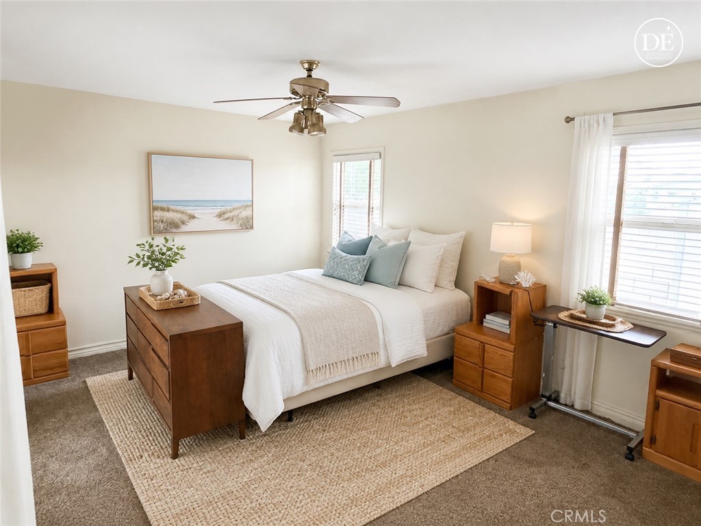 11582 Foster Road Los Alamitos, CA 90720 - Photo 13 of 26 Master Bedroom
Note: Furniture in this photo has been digitally enhanced by AI