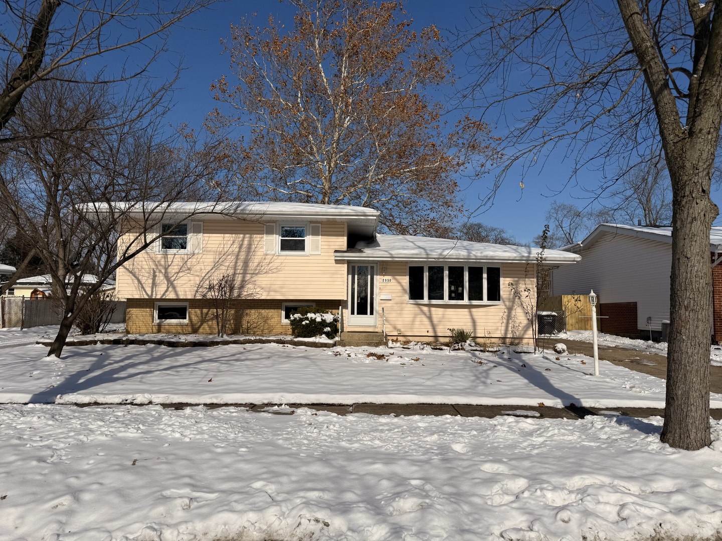 2950 188th Place Lansing, IL 60438 - Photo 1 of 1 a view of a house with snow in the yard