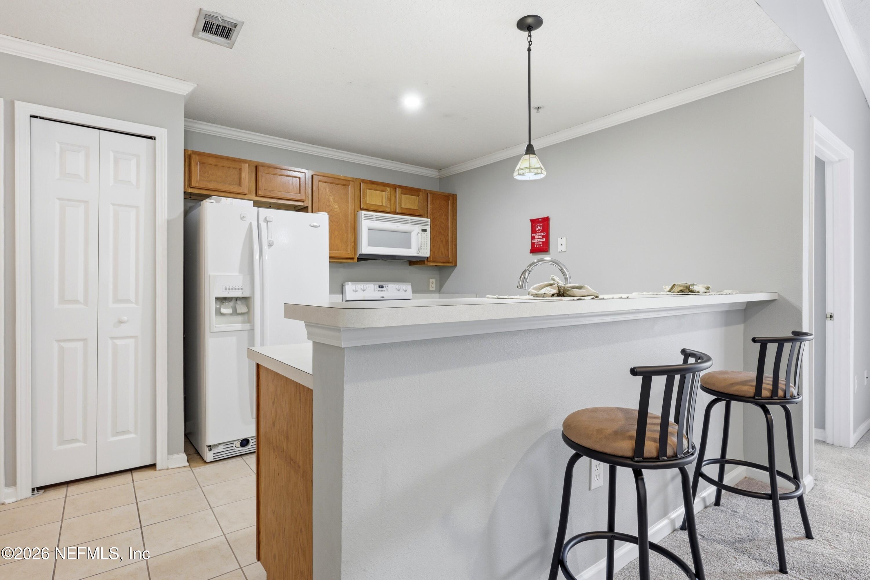 7920 Merrill Road, Unit 411 Jacksonville, FL 32277 - Photo 11 of 36 Bar Top Seating