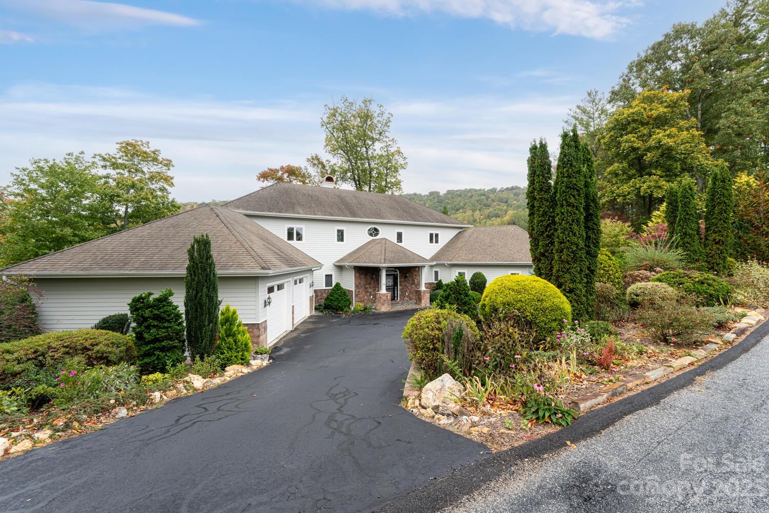 42 Country Club Road Mills River, NC 28759 - Photo 1 of 48 an aerial view of a house