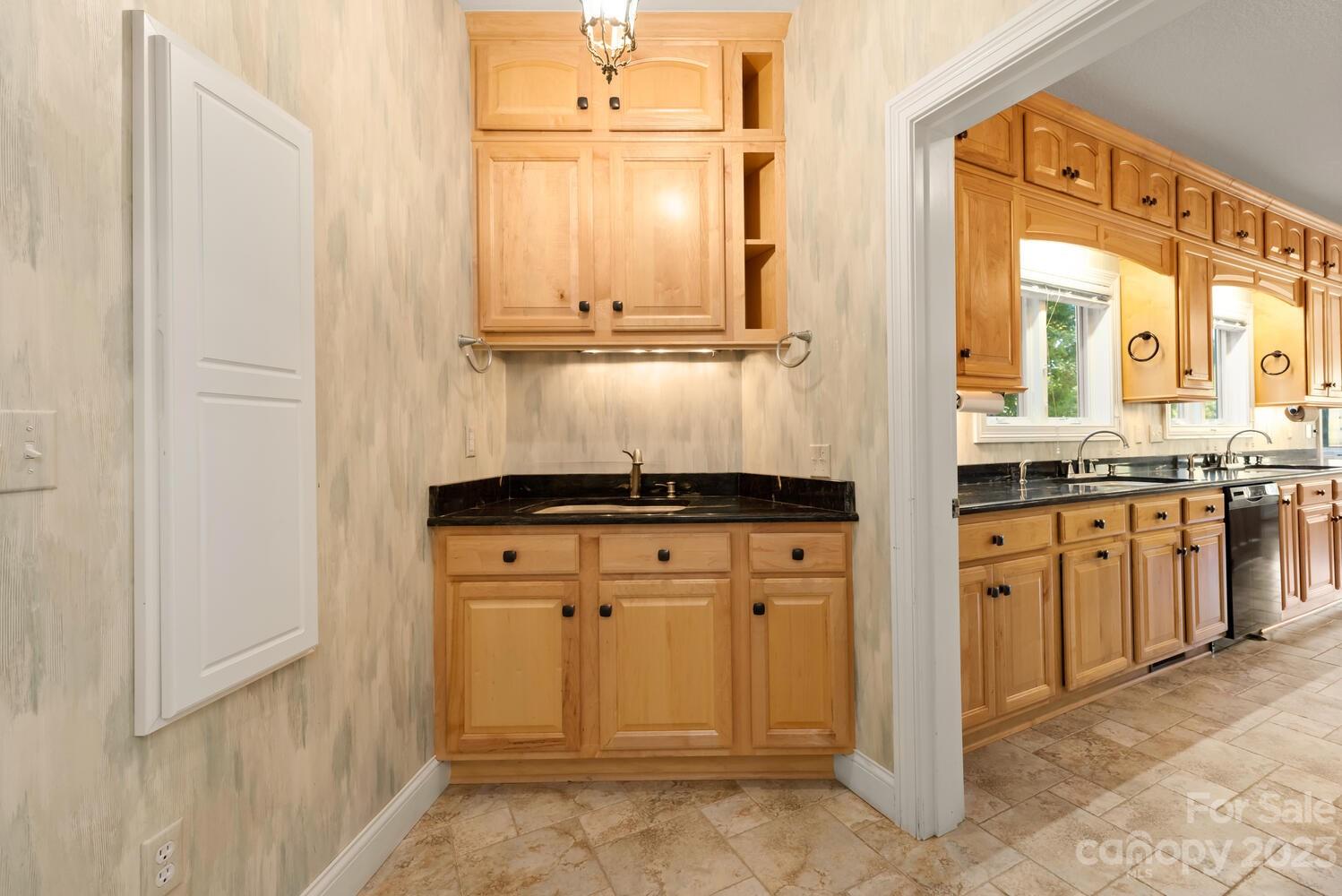 42 Country Club Road Mills River, NC 28759 - Photo 12 of 48 a bathroom with a sink and a mirror