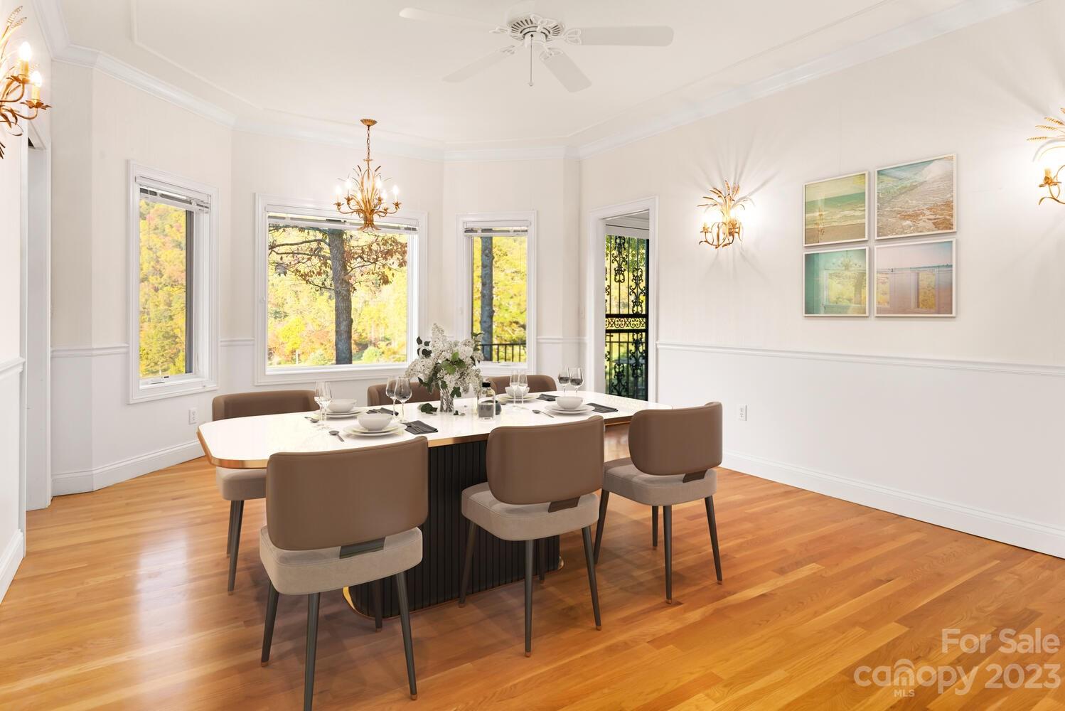 42 Country Club Road Mills River, NC 28759 - Photo 14 of 48 a dining room with wooden floor and chandelier