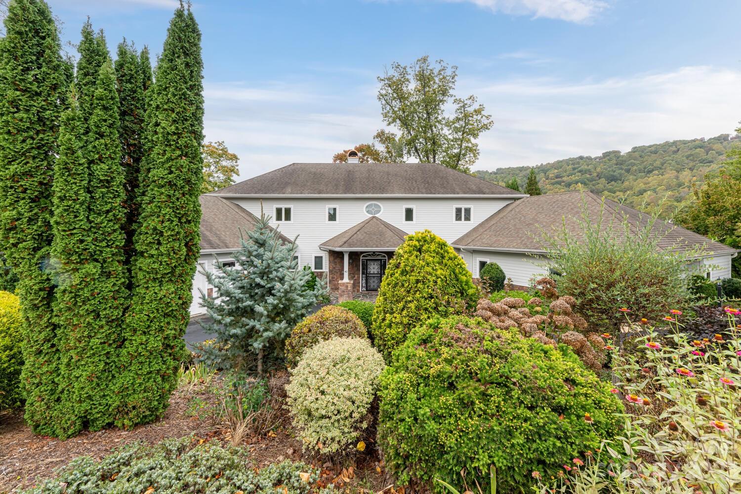 42 Country Club Road Mills River, NC 28759 - Photo 3 of 48 an aerial view of a house