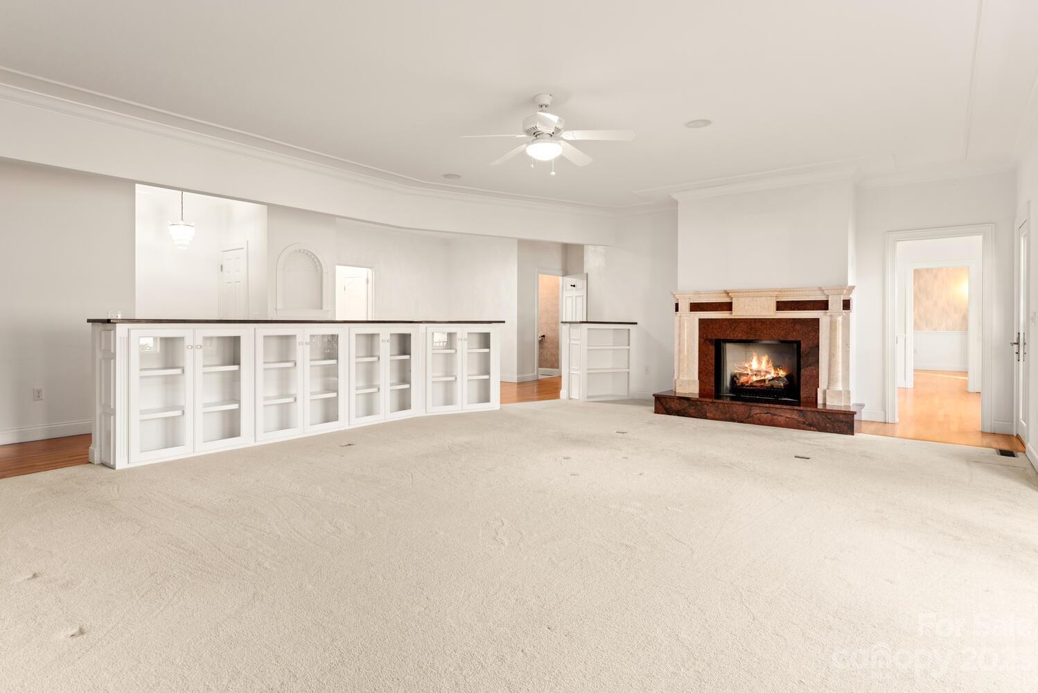 42 Country Club Road Mills River, NC 28759 - Photo 5 of 48 a view of an empty room with a fireplace