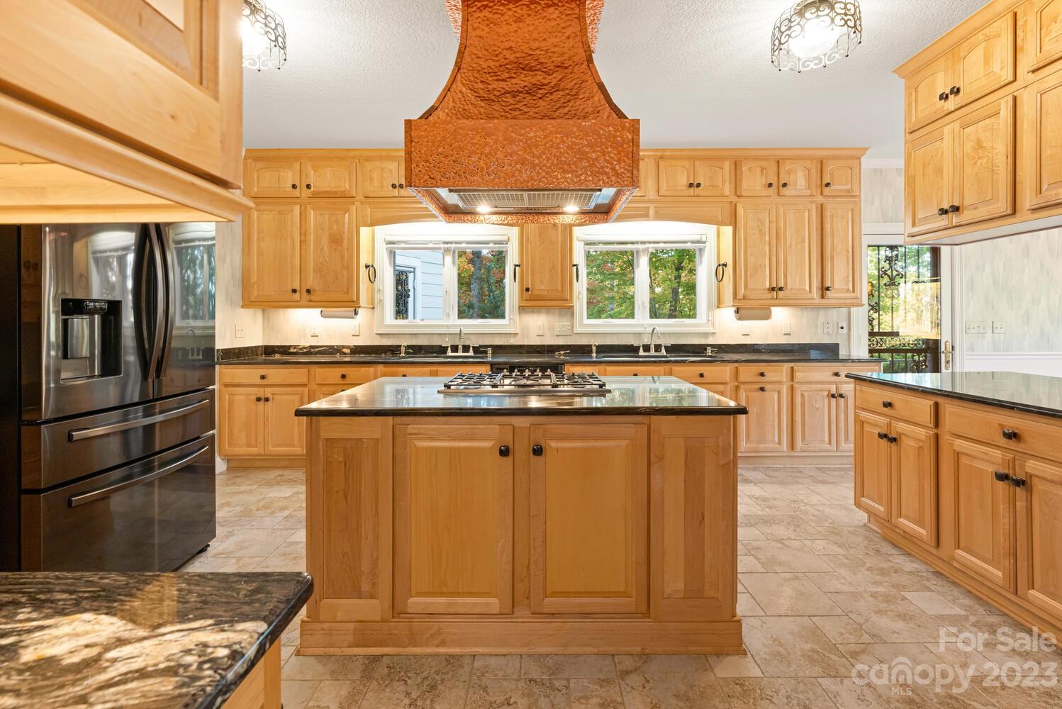 42 Country Club Road Mills River, NC 28759 - Photo 7 of 48 a kitchen with stainless steel appliances granite countertop a stove a sink dishwasher and a refrigerator
