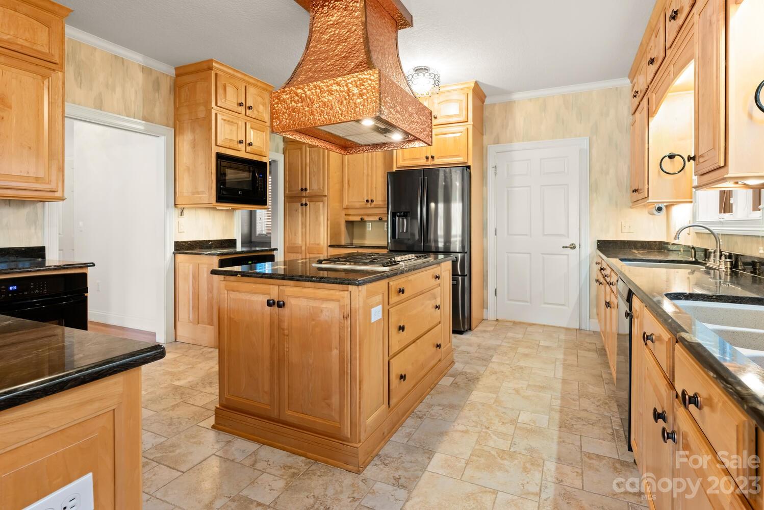 42 Country Club Road Mills River, NC 28759 - Photo 8 of 48 a kitchen with stainless steel appliances granite countertop a stove a sink and a refrigerator
