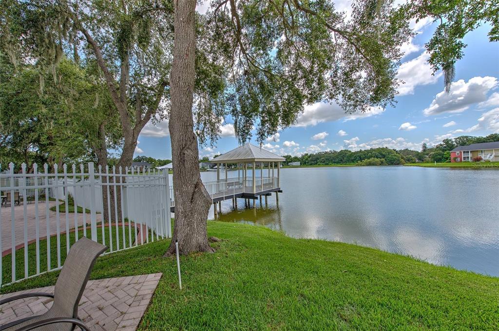 308 Lake Parsons Green, Unit 106 Brandon, FL 33511 - Photo 21 of 26 a garden view with a lake view