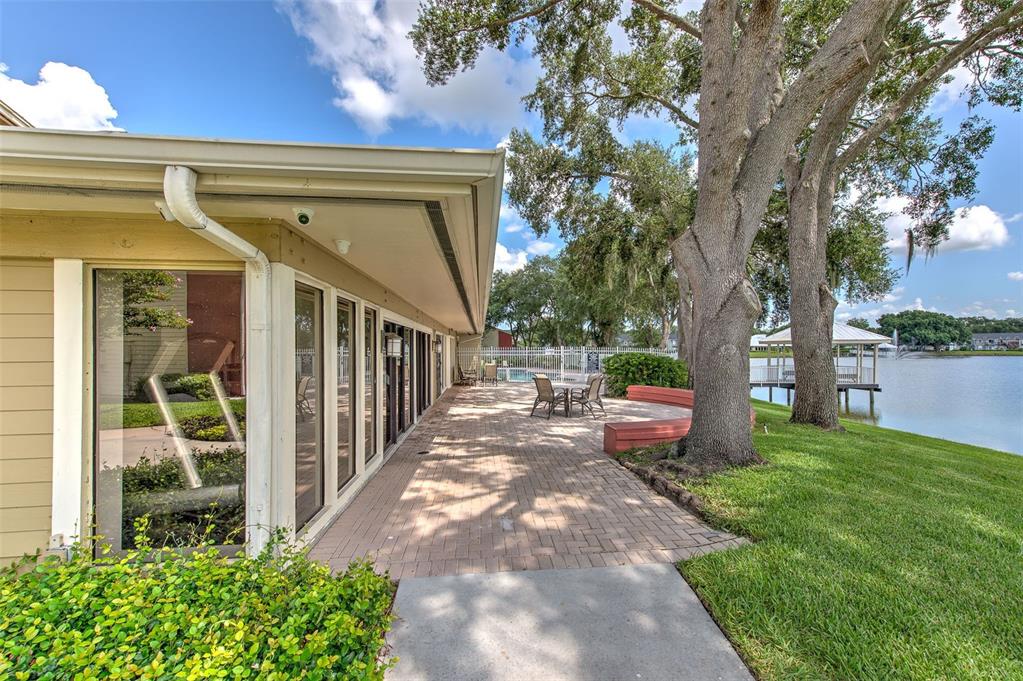 308 Lake Parsons Green, Unit 106 Brandon, FL 33511 - Photo 24 of 26 a view of a back yard of the house