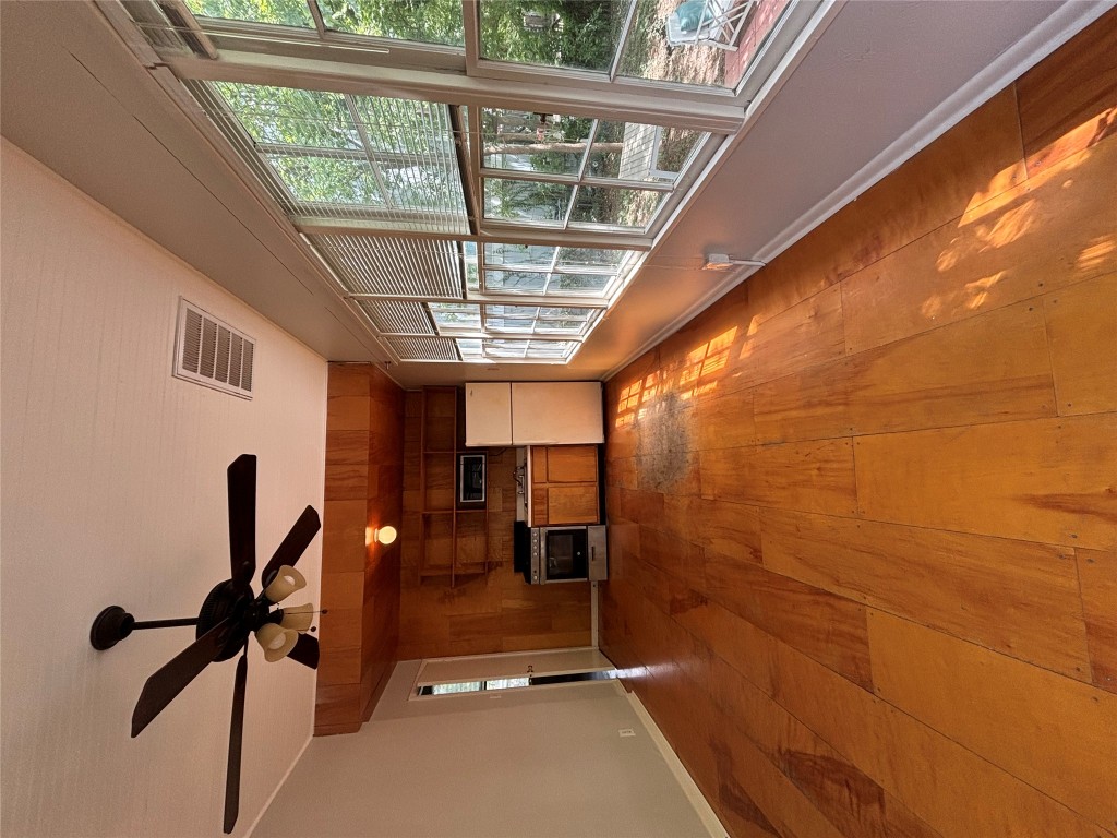 317 West 35th Street, Unit B Austin, TX 78705 - Photo 3 of 9 a view of a room with gym equipment