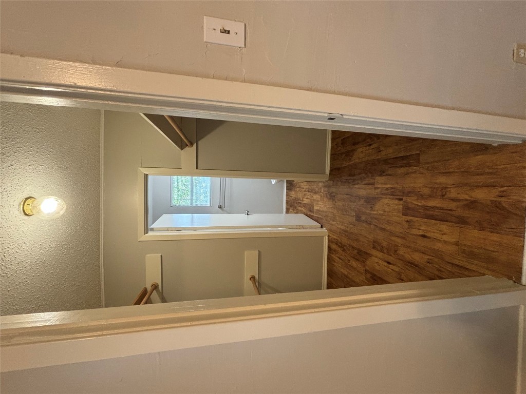 317 West 35th Street, Unit B Austin, TX 78705 - Photo 7 of 9 a view of hallway with wooden floor