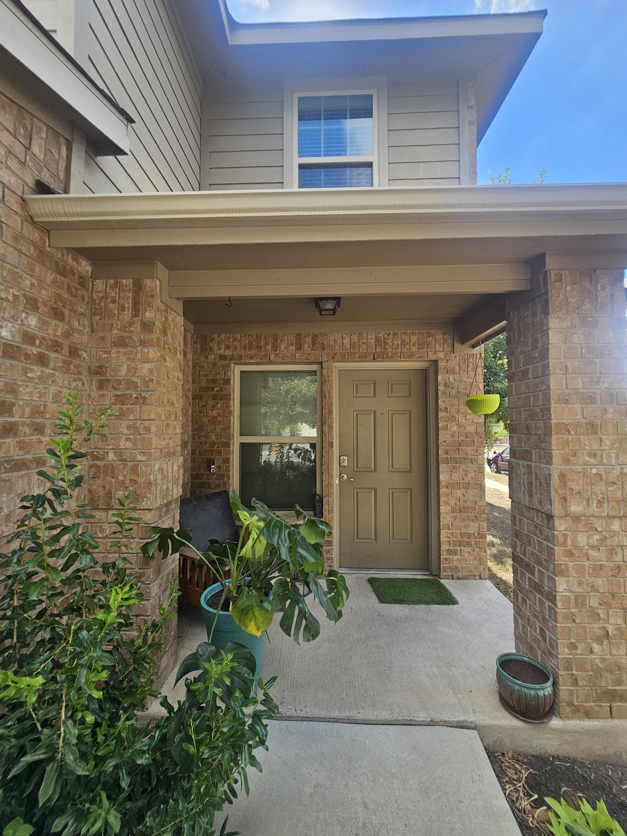 a front view of a house with a glass door